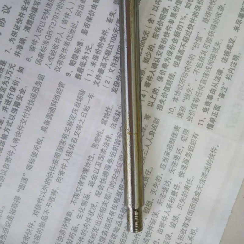 Close-up of mushroom-shaped rebar cap used for securing reinforcement bars on construction sites.