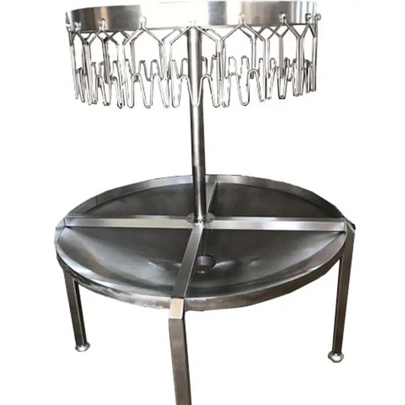 Round poultry slaughter evisceration table