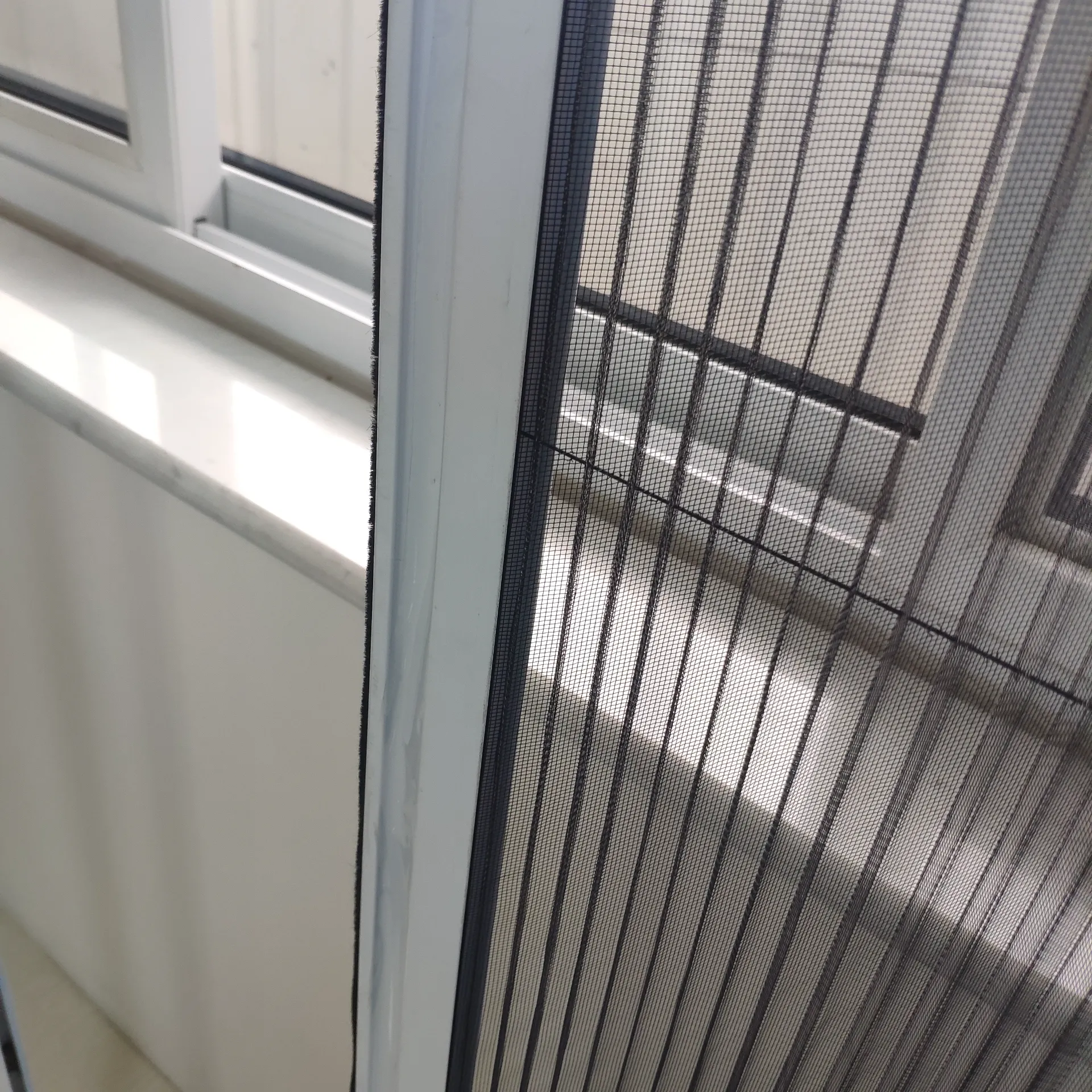 Low Bottom Rail Pleated Screen Door