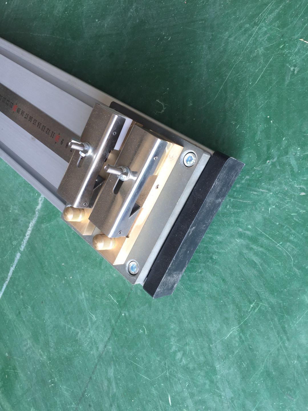 Factory producing manual tensile testers for material strength and quality testing purposes.