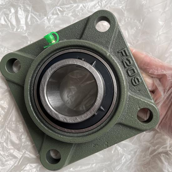 UCF209-28 outer spherical flange bearing with seat