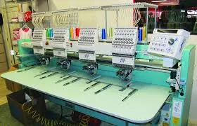 Pequeño fabricante de máquinas de bordado Pequeño fabricante de máquinas de bordado