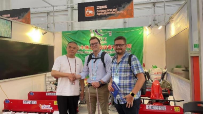 Compact reaper machine for harvesting small crops efficiently on farms and gardens.