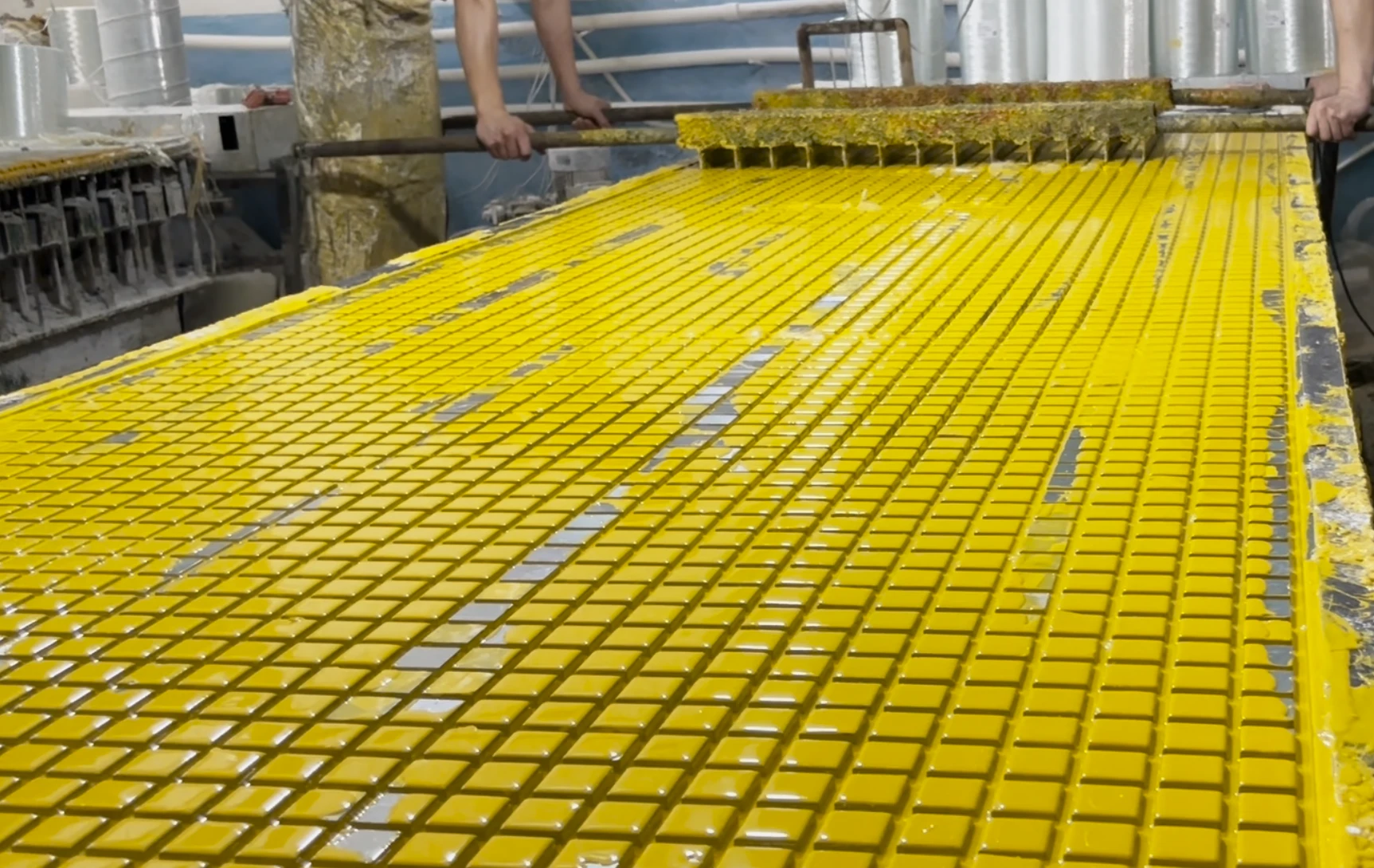 Bright and Strong: Yellow FRP Grating Takes Shape via Compression Molded