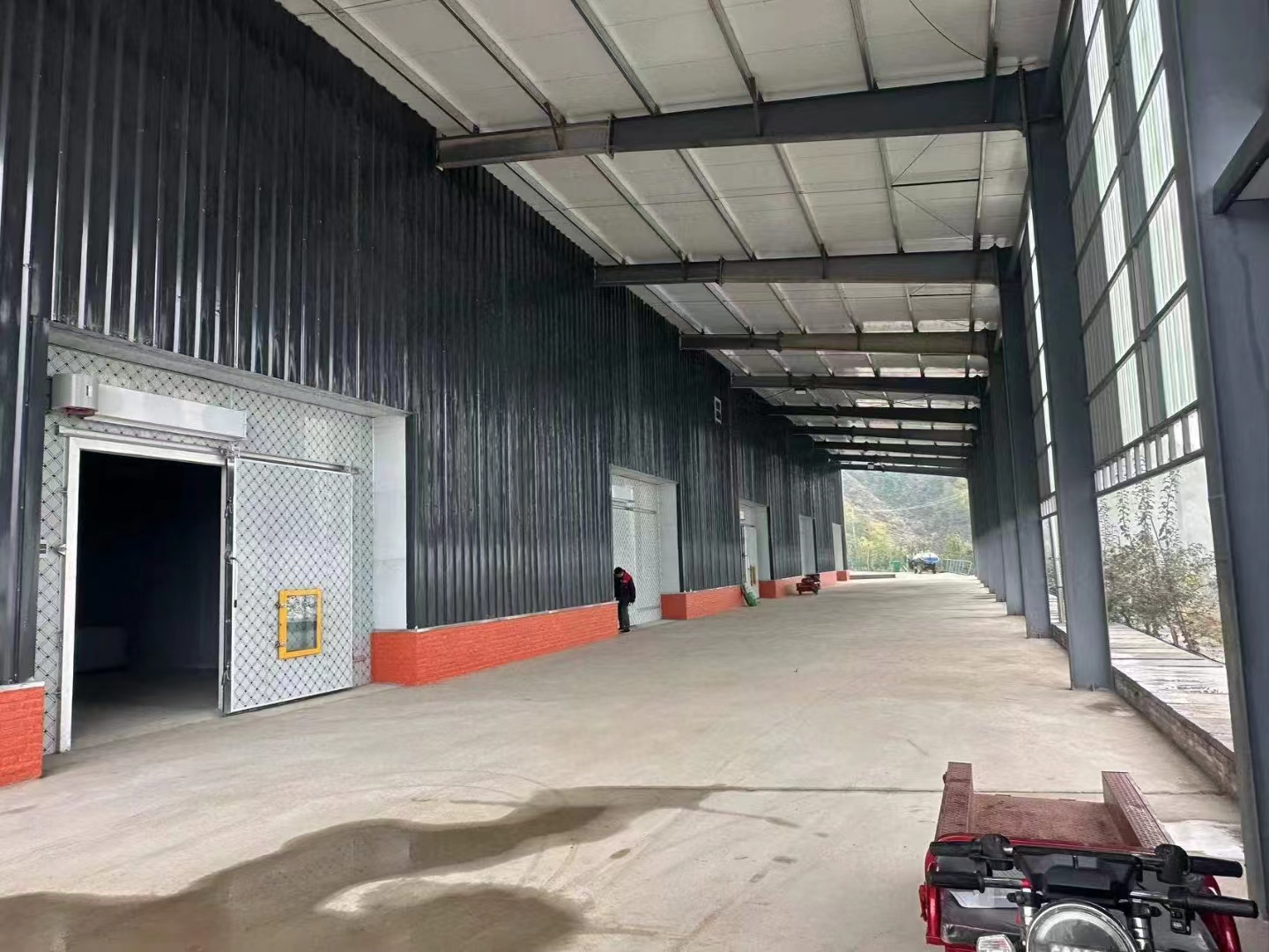 Anteroom in frigid storage facility for perishable goods with climate-controlled environment.