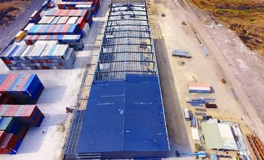 small metal shed with floor