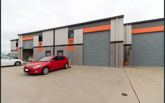 Charming Red Barn-Style House for Cozy Living and Rustic Appeal