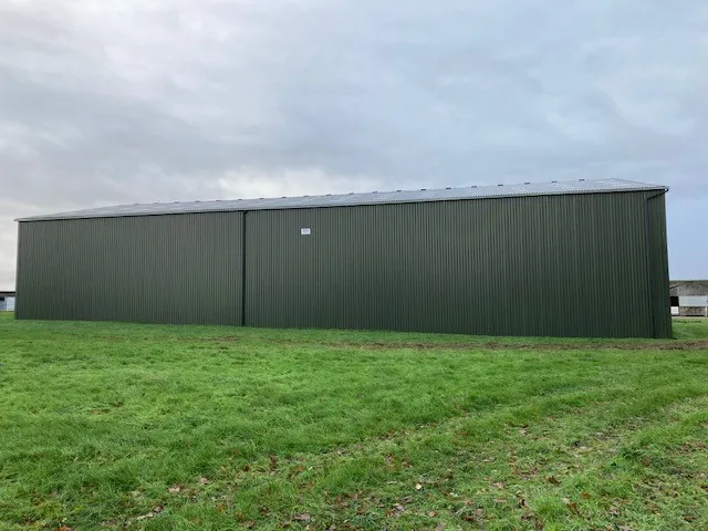 Two-Level Steel Garage for Enhanced Storage and Parking Solutions
