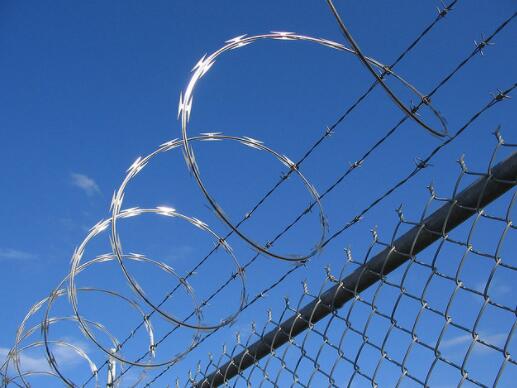 Barbed rope guardrail net installation