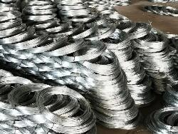 Large coils of galvanized wire are used as binding wire in the building