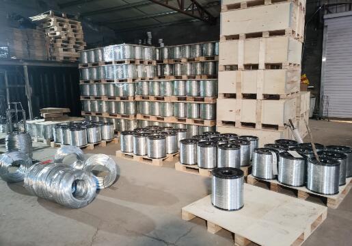 Large coils of galvanized wire are used as binding wires