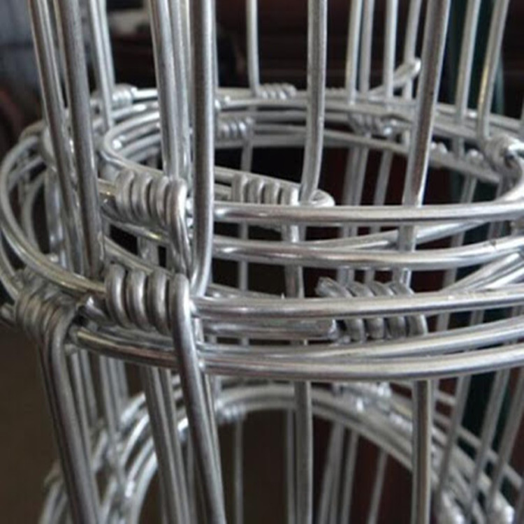 installing barbed wire fence