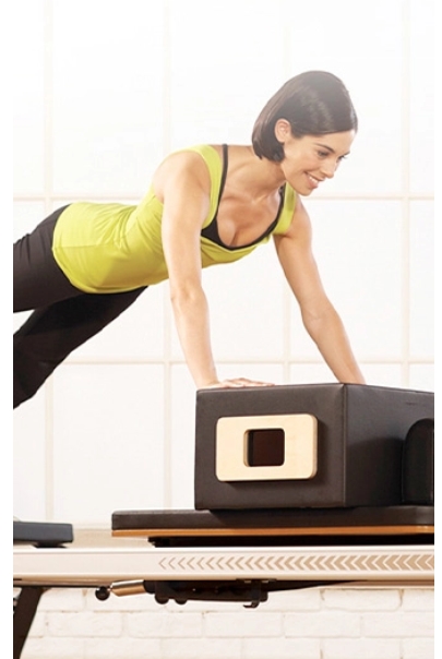 Reclaim Natural Spinal Curvature Using The Balanced Body Arc Barrel