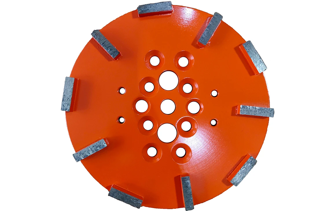 <p>Diamond grinding plates are heavy-duty tools used for grinding large surfaces, especially in commercial or industrial settings. Like grinding shoes, these plates are embedded with diamond segments to enhance their grinding power. Diamond grinding plates are typically used with floor grinding machines to remove coatings, smooth rough floors, and level uneven surfaces. Their durability and high material removal rate make them ideal for use in large-scale projects, including concrete floor preparation, surface cleaning, and restoration. These plates are essential for achieving high-efficiency grinding on tough materials and large surface areas.</p>