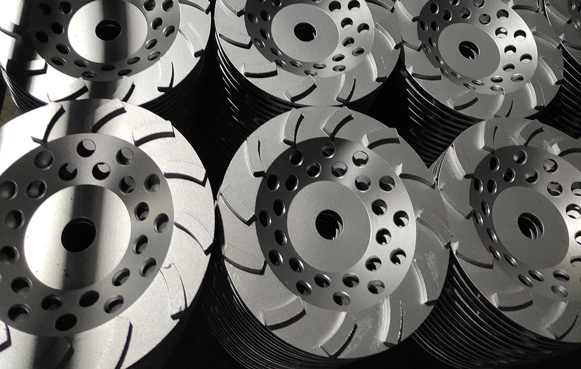 <p>Diamond cup wheels are grinding tools that feature a series of diamond segments embedded in a circular wheel. These wheels are primarily used for surface preparation, smoothing, and polishing of concrete, granite, marble, and other hard materials. Diamond cup wheels are often used in industries such as flooring, construction, and stone fabrication for tasks like grinding rough surfaces, removing coatings, or leveling uneven concrete floors. Their efficient grinding capability and long-lasting performance make them an essential tool for industrial applications requiring high material removal rates and a smooth finish.</p>