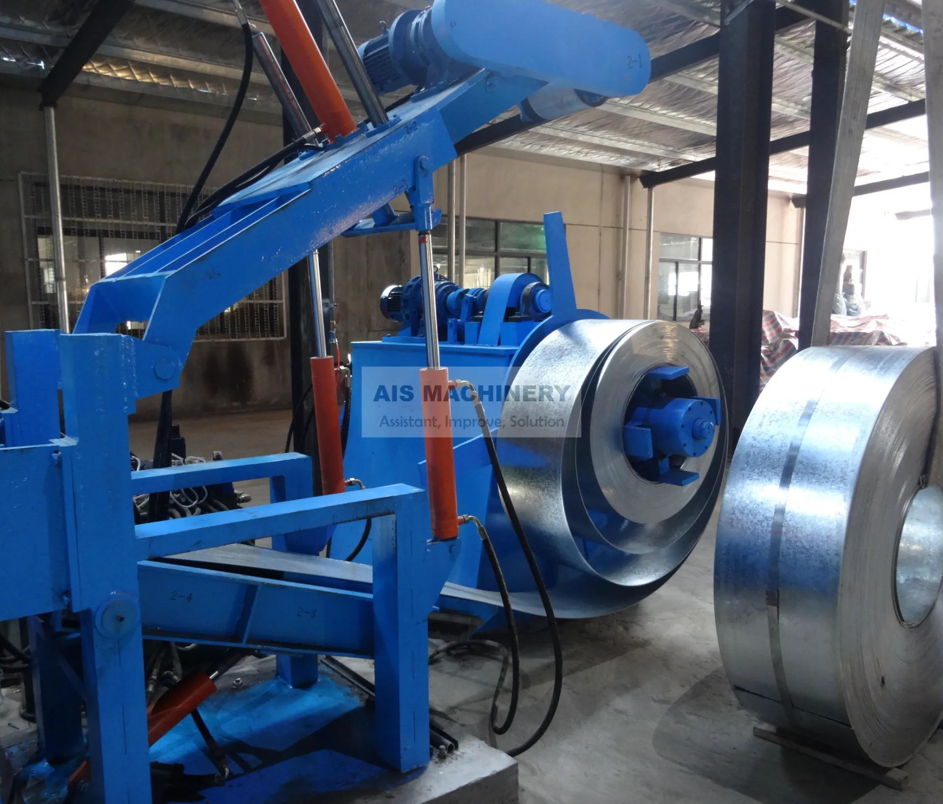 Single head Uncoiler with peeler and hold down roll