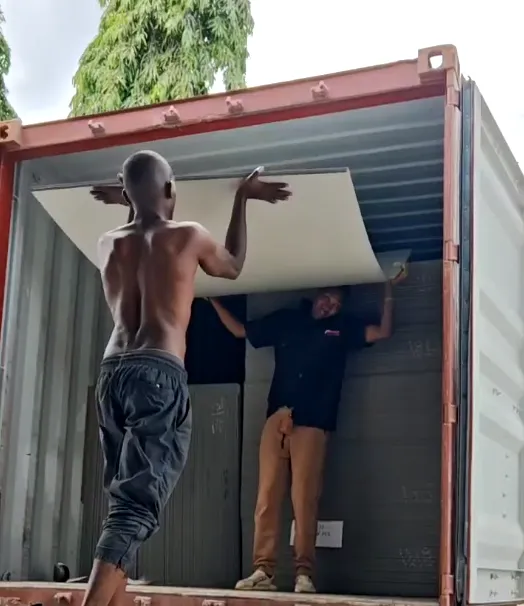 Located in eastern Africa.The two containers filled with ACP panels purchased by customers from Tanzania at our factory have arrived and are currently being unloaded.