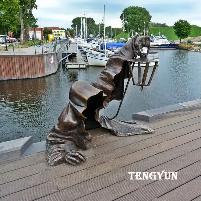 Famous Antique Juodasis Abstract Metal Bronze Ghost statue With Lamp For Pond Decoration