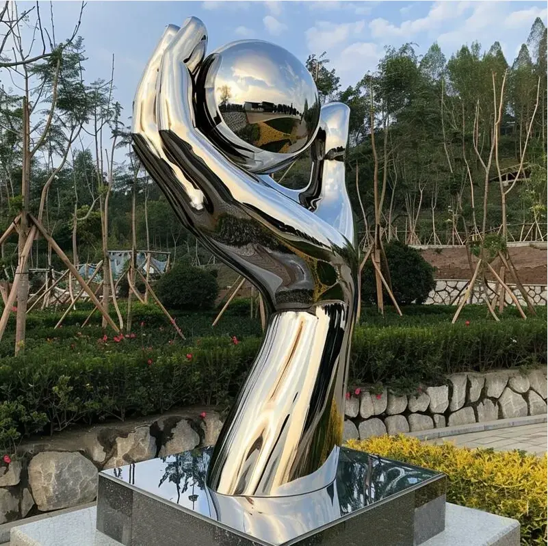 Public Decorative Stainless Steel Sculptures Big Size Hand Holding A Ball Modern Art Ornament