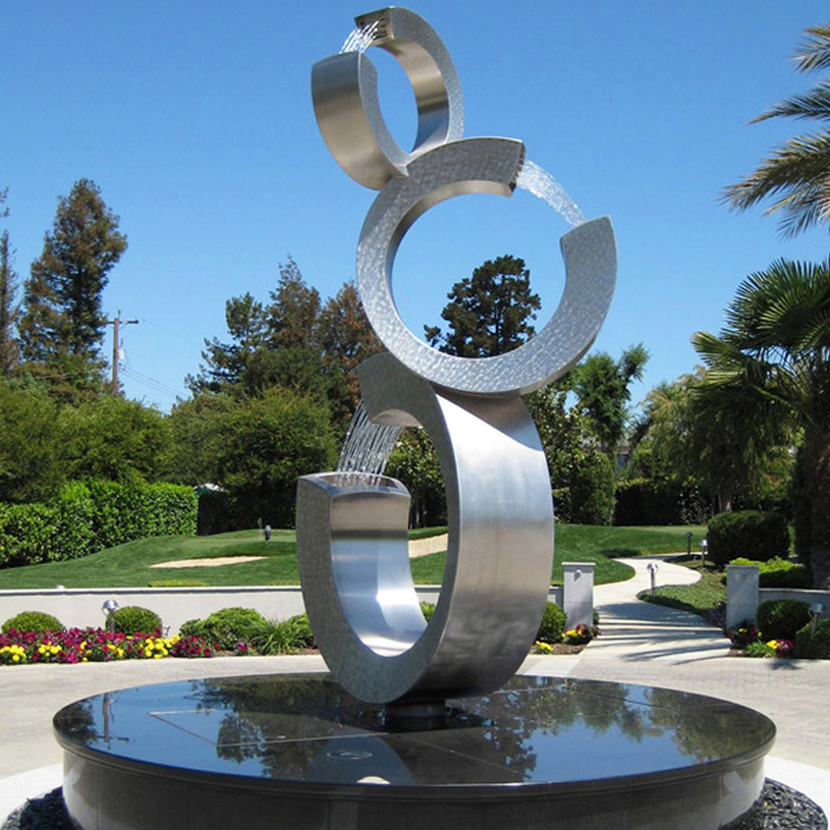 https://www.firststatue.com/outdoor-modern-large-size-stainless-steel-water-fountain-three-ring-sculptural-fountains-product/