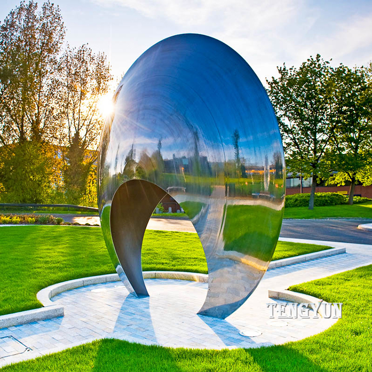 aafbp20Stainless steel public art sculpture moongate moon gate designed by Allison ArmourDesign Allison ArmourFrimley Business Park, SurreyOrnamentsMarcus Harpur