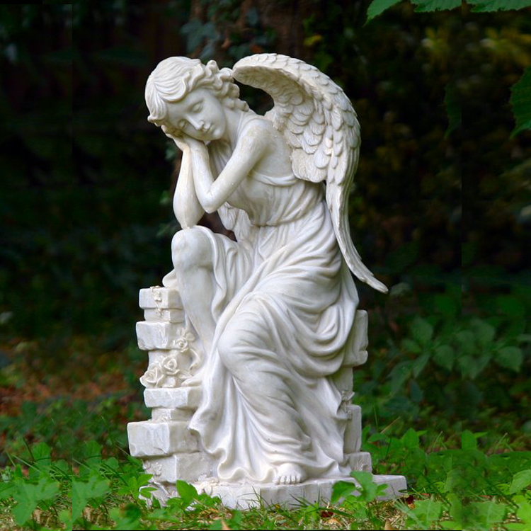 angel-sleeping-on-wall-01