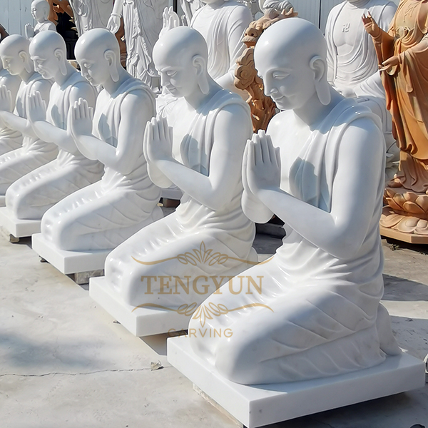 white marble stone buddha statue