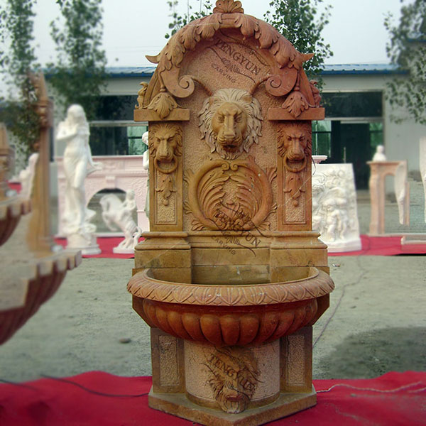 yellow marble wall fountain