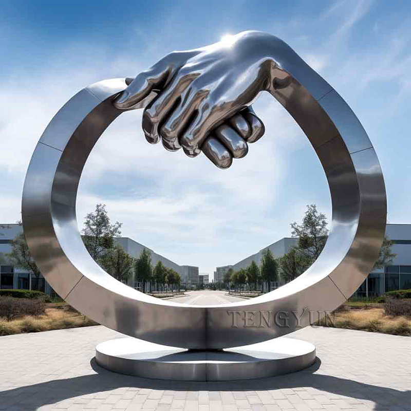 https://www.firststatue.com/large-size-stainless-steel-handshake-abstract-sculpture-for-sale-product/