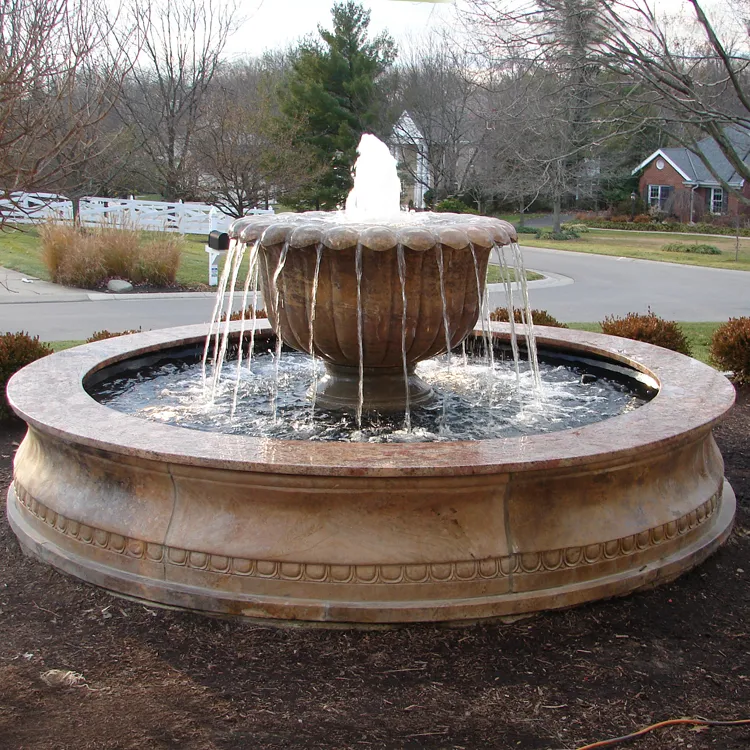 fountain in front of house