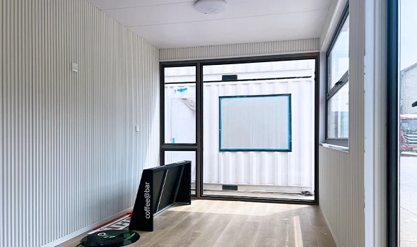 <p>Inside, you control flooring, wall finishes, built-in furniture, partitions, and storage. MEP planning covers electrical runs, plumbing pods, HVAC capacity, ventilation, and communication networks.</p>
<p>Energy upgrades like solar panels, batteries, efficient lighting, and high-performance insulation support long-term sustainability. Safety features include fire detection, accessibility solutions, and structural upgrades for wind or seismic needs.</p>
<p>For easier logistics, projects can use flat-pack modules, bolt-together systems, or full turnkey installation. Smart features such as BMS control, remote monitoring, access management, and IoT sensors complete a modern container transformation.</p>