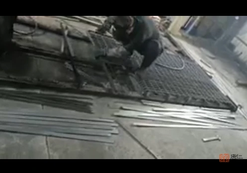 Professional Workers Are Welding Steel Grating