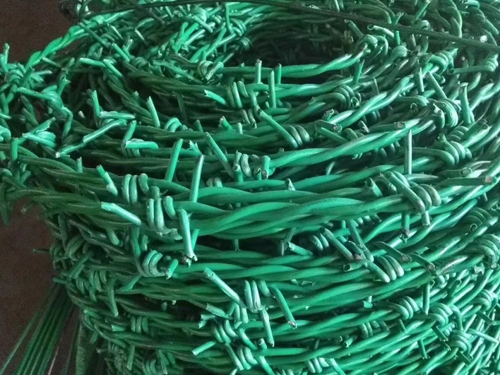 What is plastic coated barbed wire?