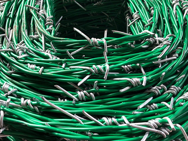 What is plastic coated barbed wire?