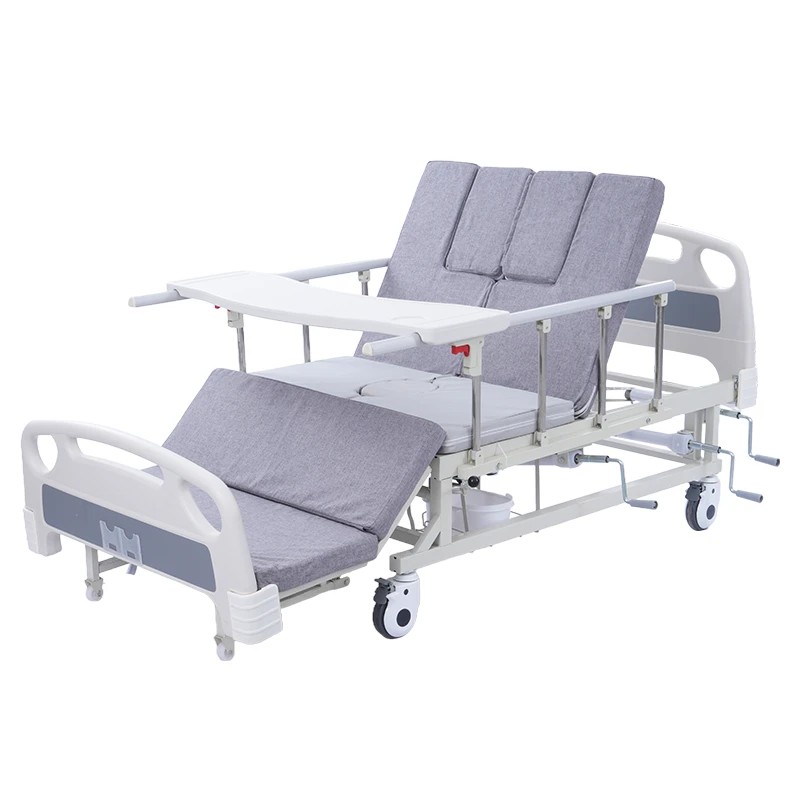Three cranks manual turning full curvature nursing bed