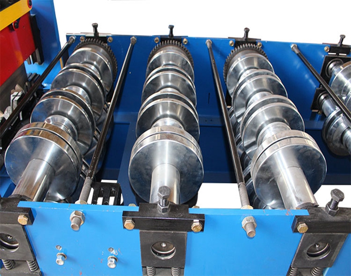 Steel deck floor roll forming machine