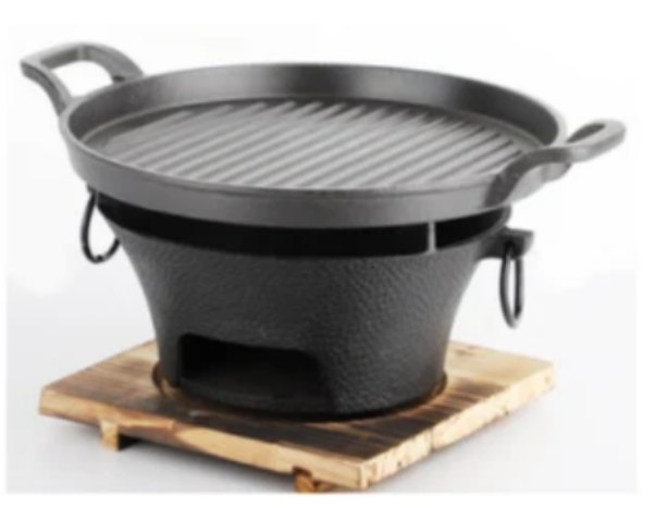 Forging Flavor In A Cast Iron BBQ Grill's Fire